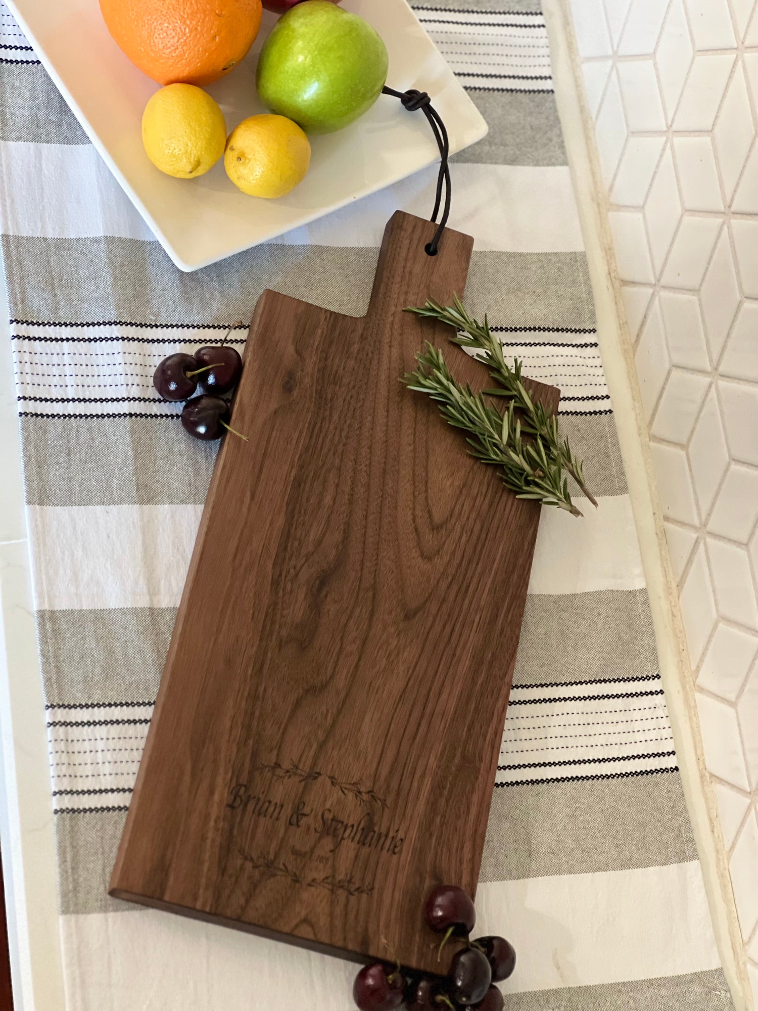 Personalized Walnut Charcuterie Board - Couples Names and Anniversary Date engraved on it.